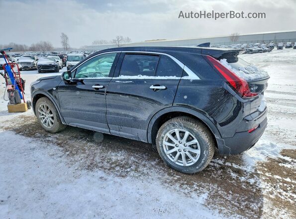 1GYAZAR40MF079690 2021 CADILLAC XT4 Black Trasero izquierdo