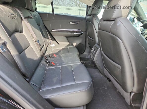 1GYAZAR40MF079690 2021 CADILLAC XT4 Black Vista interior trasera