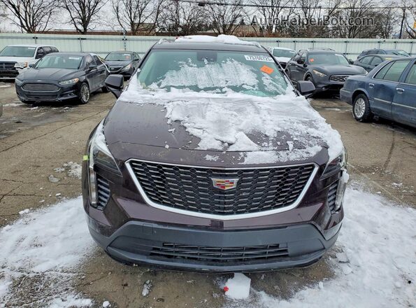 1GYAZAR44MF058809 2021 CADILLAC XT4 Burgundy Դիմացի տեսք