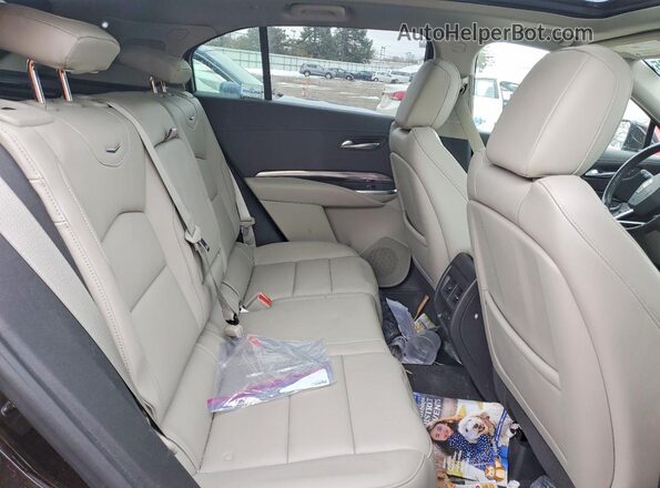 1GYAZAR44MF058809 2021 CADILLAC XT4 Burgundy Սալոնի հետևի տեսք