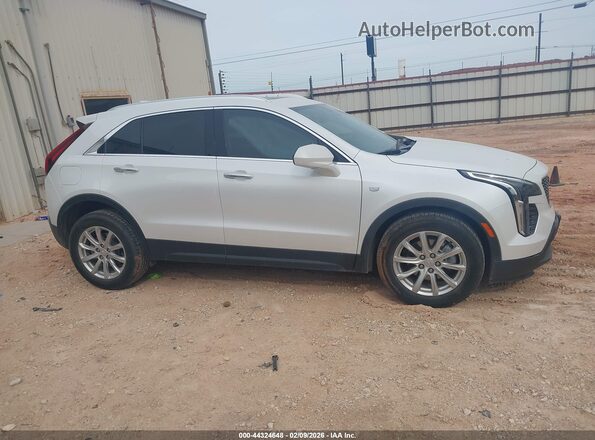 1GYAZAR44NF109646 2022 CADILLAC XT4 White Սալոնի հետևի տեսք