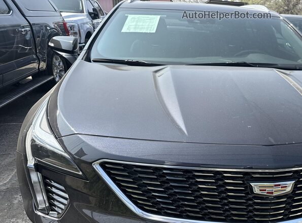 1GYFZDR43PF174188 2023 CADILLAC XT4 Black წინა ხედი