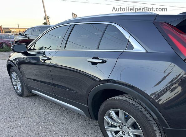 1GYFZDR43PF174188 2023 CADILLAC XT4 Black უკანა მარცხენა