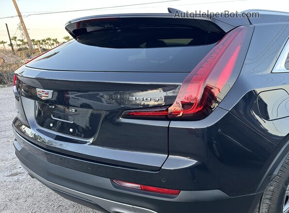 1GYFZDR43PF174188 2023 CADILLAC XT4 Black უკანა მარჯვენა