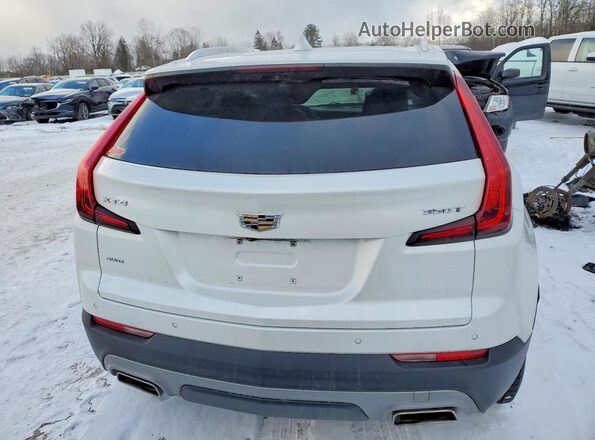 1GYFZDR49NF170921 2022 CADILLAC XT4 White Вид ззаду