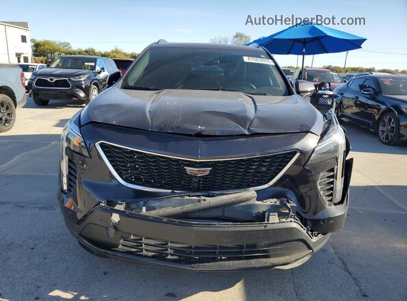 1GYFZER47PF100682 2023 CADILLAC XT4 Black Vista frontal