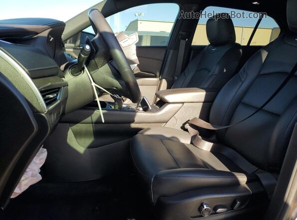 1GYFZER47PF100682 2023 CADILLAC XT4 Black Vista interior delantera