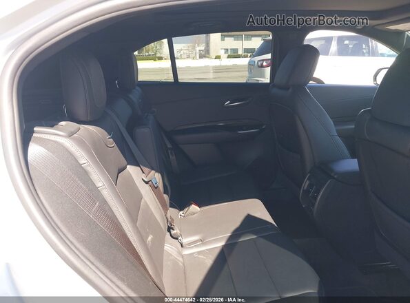1GYFZER4XNF108059 2022 CADILLAC XT4 White VIN sticker view