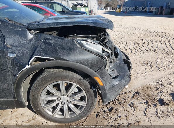 1GYFZFR45NF107326 2022 CADILLAC XT4 Black 