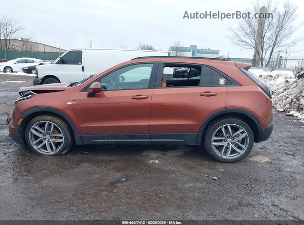 1GYFZFR47KF146513 2019 CADILLAC XT4 Orange Vista interior trasera
