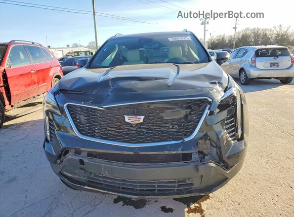 1GYFZFR49NF114148 2022 CADILLAC XT4 Black წინა ხედი