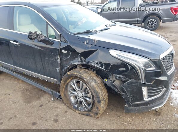 1GYKNDR49PZ111430 2023 CADILLAC XT5 Black წინა ხედი