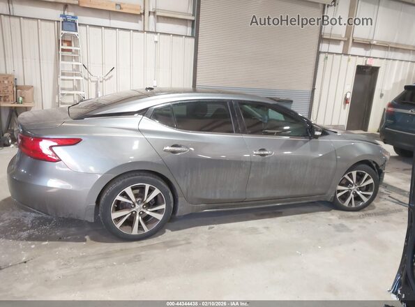 1N4AA6AP5GC381522 2016 NISSAN MAXIMA Серебряный Вид задней части салона