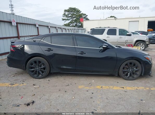 1N4AA6EV9PC501704 2023 NISSAN MAXIMA SR Black Widok wnętrza z tyłu