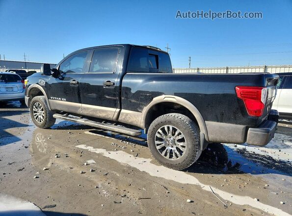 1N6BA1F28GN504987 2016 NISSAN TITAN Черный Задняя левая четверть