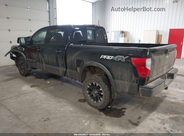 1N6BA1F41HN514893 2017 NISSAN TITAN XD Black Trasero izquierdo