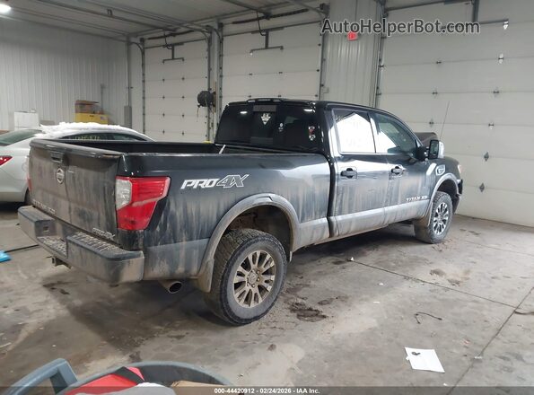 1N6BA1F41HN514893 2017 NISSAN TITAN XD Black Trasero derecho