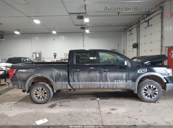 1N6BA1F41HN514893 2017 NISSAN TITAN XD Black Vista interior trasera