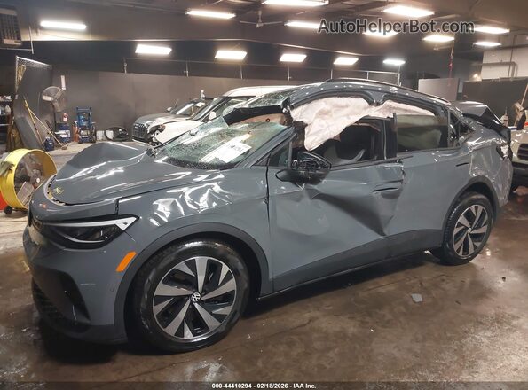 1V2BMPE82SC000571 2025 VOLKSWAGEN ID.4 Gray Widok deski rozdzielczej