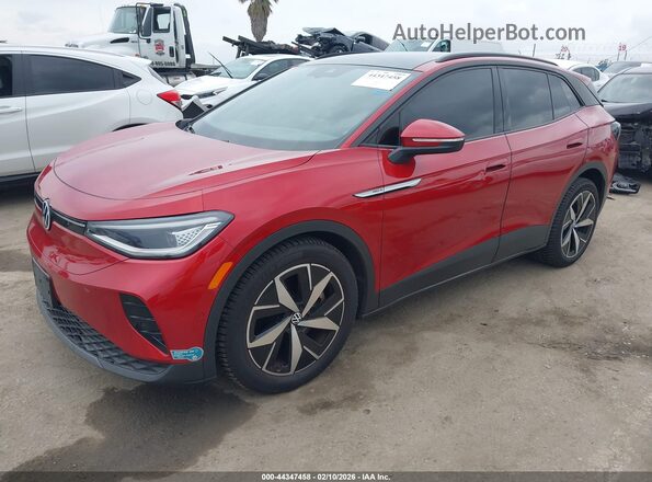 1V2FMPE86PC010965 2023 VOLKSWAGEN ID.4 Red Vista tres cuartos delantera izquierda