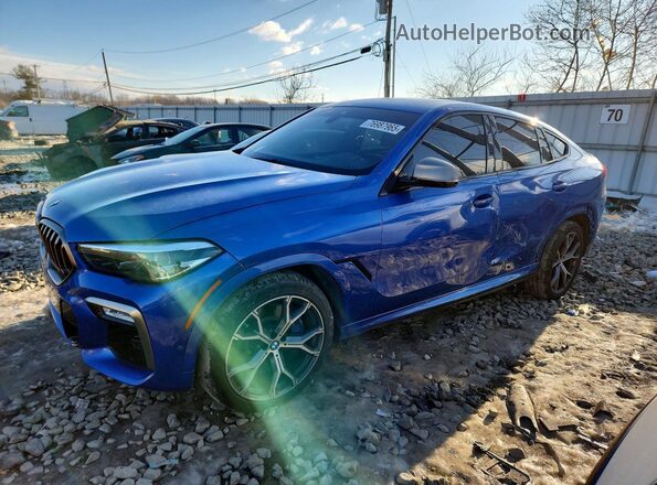 5UXCY8C05L9B07238 2020 BMW X6 Blue Trasero izquierdo