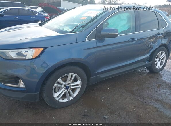 2FMPK3J97KBB25470 2019 FORD EDGE Blue Դիմացի տեսք