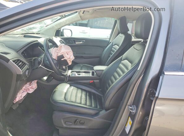 2FMPK4J92RBA79286 2024 FORD EDGE Gray წინა სალონის ხედი