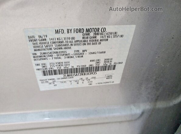 2LMHJ5AT2KBL03935 2019 LINCOLN MKT Silver VIN կոդի պիտակի տեսք
