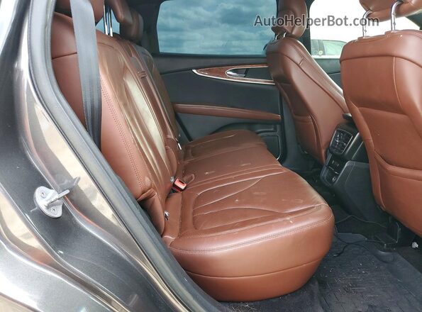 2LMPJ6LR8HBL39477 2017 LINCOLN MKX Gray Vista de los asientos traseros