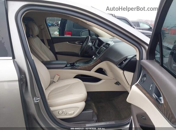 2LMTJ6LP9GBL20626 2016 LINCOLN MKX Gold წინა სალონის ხედი