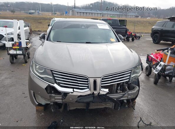 2LMTJ6LP9GBL20626 2016 LINCOLN MKX Gold ხელსაწყოთა პანელის ხედი