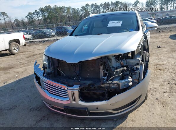 2LMTJ8LP9GBL69563 2016 LINCOLN MKX Silver Սարքավորումների վահանակի տեսք