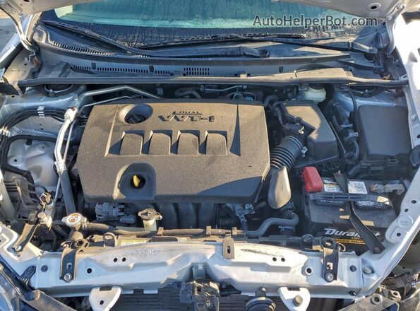 2T1BURHE0JC092865 2018 TOYOTA LL Silver Вид задньої частини салону