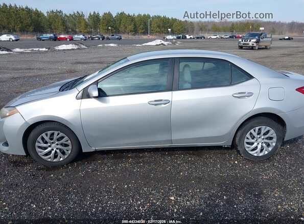 2T1BURHE2JC115062 2018 TOYOTA LL Silver უკანა სალონის ხედი