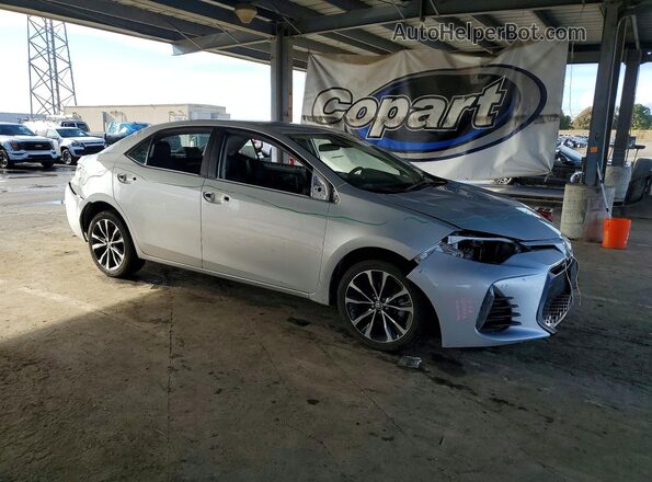 2T1BURHE3JC059083 2018 TOYOTA LL Серебряный Передняя правая четверть