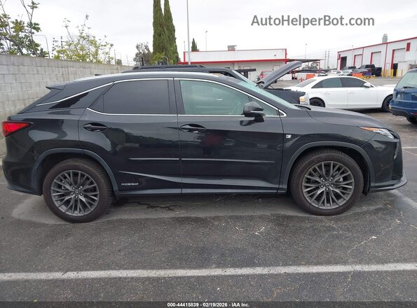 2T2BGMCA0HC017085 2017 LEXUS RX 450H Черный Вид задней части салона