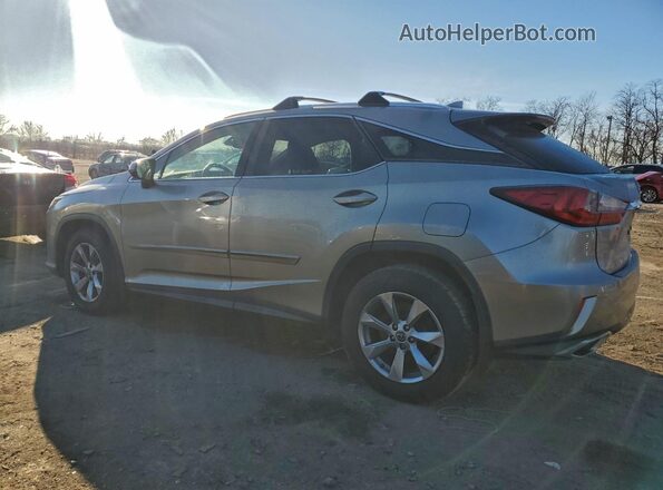 2T2BZMCA3KC211773 2019 LEXUS RX Silver Trasero izquierdo