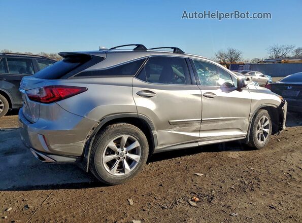 2T2BZMCA3KC211773 2019 LEXUS RX Silver Trasero derecho