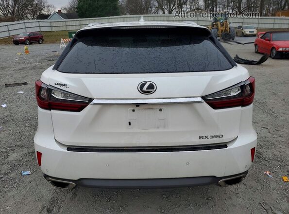 2T2BZMCA4KC186883 2019 LEXUS RX White 