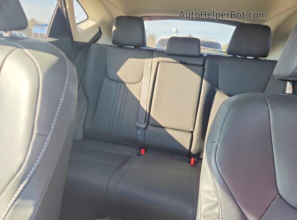 2T2GDCAZ4RC011177 2024 LEXUS NX Tan Rear seats view