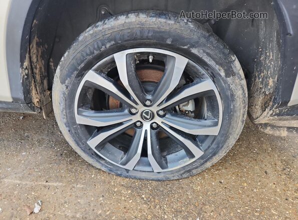 2T2HZMAA3MC208520 2021 LEXUS RX Cream 