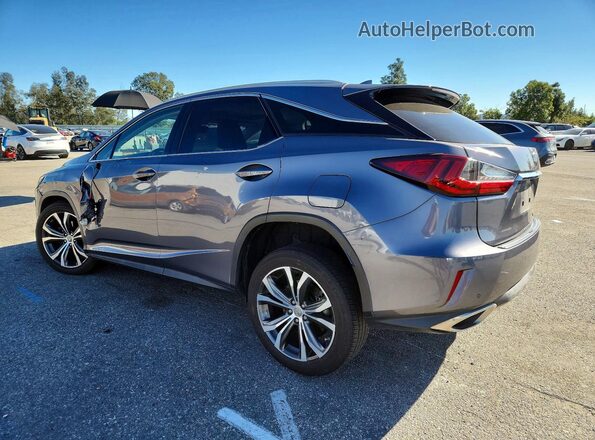 2T2ZZMCA0HC082446 2017 LEXUS RX Gray Trasero izquierdo