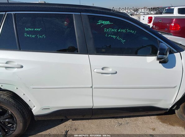 2T3E6RFV3PW041661 2023 TOYOTA RAV4 HYBRID White Vista interior trasera