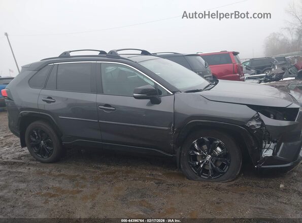 2T3E6RFV8PW041395 2023 TOYOTA RAV4 HYBRID Gray Vista interior trasera