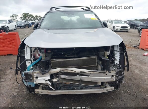 2T3EWRFV0KW045689 2019 TOYOTA RAV4 HYBRID Silver უკანა სალონის ხედი