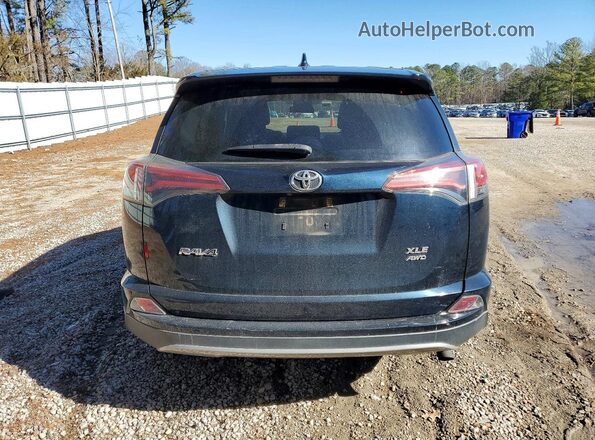 2T3RFREV0JW819327 2018 TOYOTA RAV4 Black Vista trasera