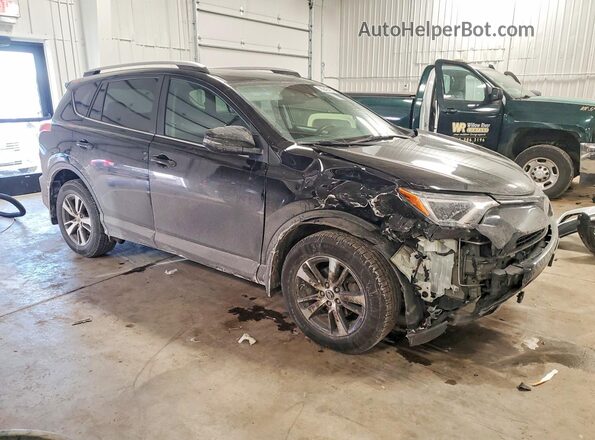 2T3RFREV1JW824472 2018 TOYOTA RAV4 Черный Передняя правая четверть
