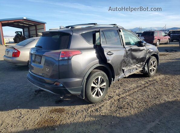 2T3RFREV9JW750444 2018 TOYOTA RAV4 Charcoal Trasero derecho
