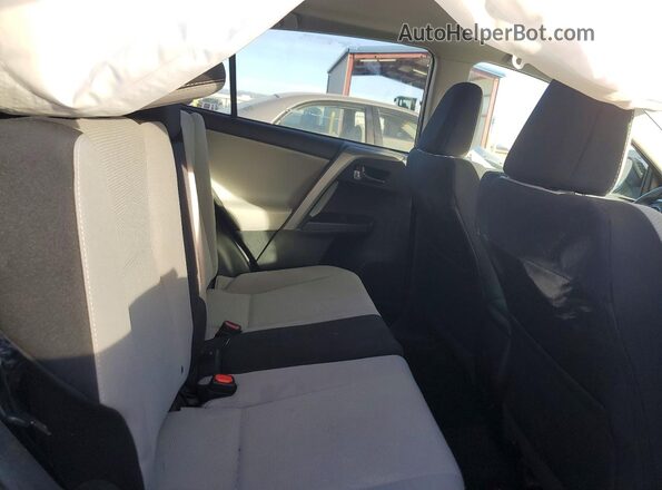 2T3RFREV9JW750444 2018 TOYOTA RAV4 Charcoal Vista de los asientos traseros