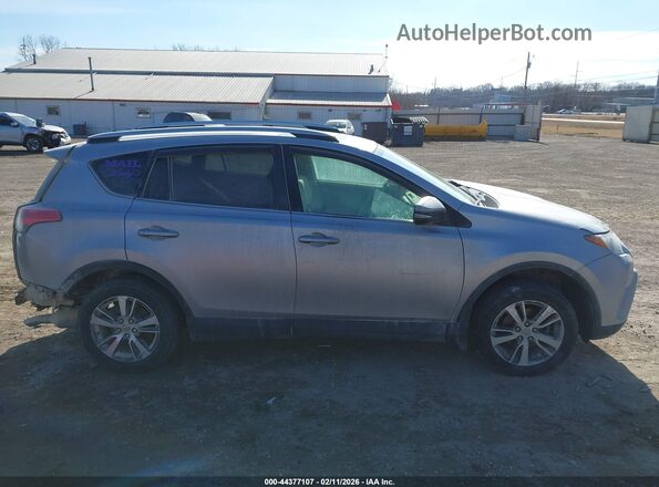 2T3RFREVXGW537088 2016 TOYOTA LE Silver Вид задньої частини салону